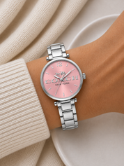 Reloj Coach Plateado Fondo Rosado