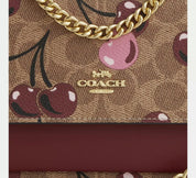 Coach Mini klare Cereza