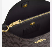 Coach Bucket Mollie Marrón