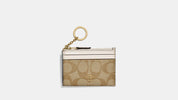 Coach Mini Skinny Wallet – Signature Canvas Khaki y Blanco